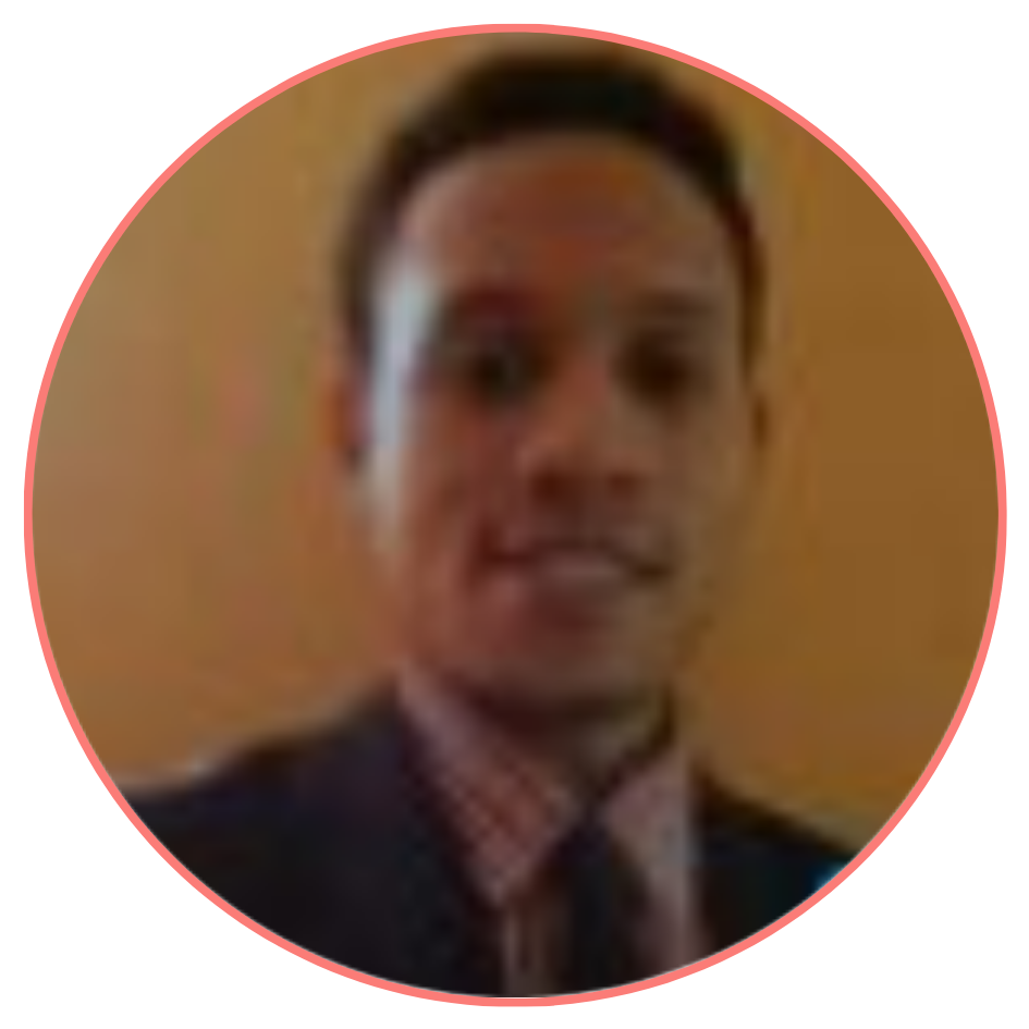 Professional man in a suit smiling, enclosed within a circular frame.