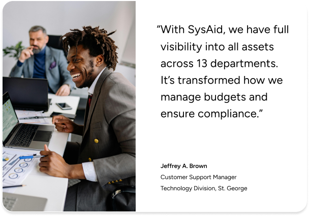 Two professionals use laptops in an office as a SysAid ITSM testimonial highlights improved service desk efficiency. - SysAid