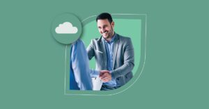 A smiling man in a gray blazer shaking hands, framed within an abstract white outline against a soft green background with a cloud icon.