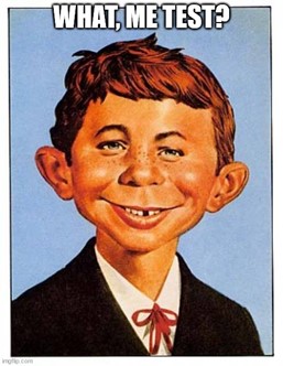 Illustration of Alfred E. Neuman, the mascot of Mad Magazine, with a smirk and the caption "What, me shift-left testing?