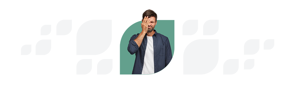 A man in a denim shirt and blue jacket holding his head in distress or confusion, set against a split green and white background.